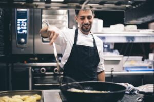 Cook at work in a restaurant kitchen