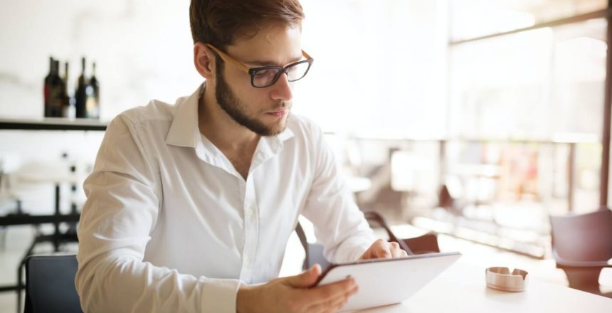 Busy businessman working in restaurant Busy businessman working in restaurant
