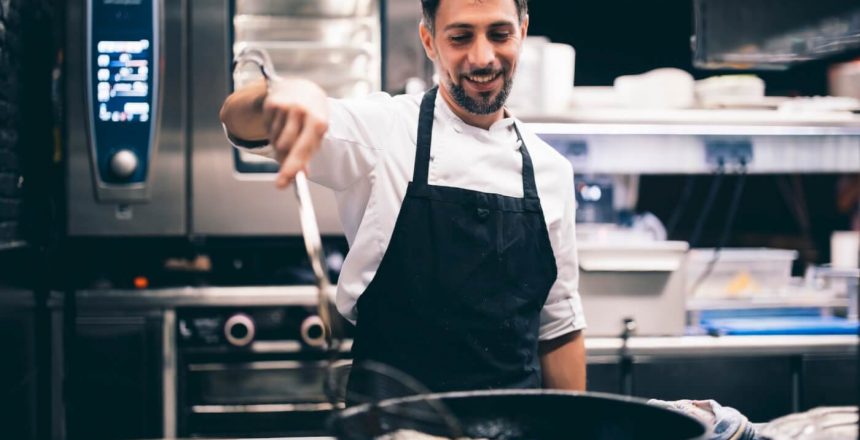 Cook at work in a restaurant kitchen